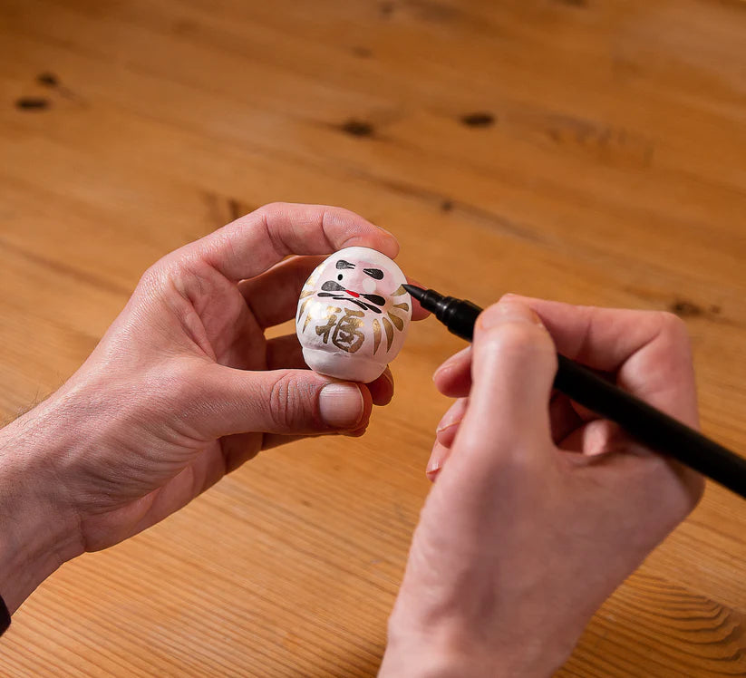 Daruma Blanc – Talisman japonais pour attirer l’Amour